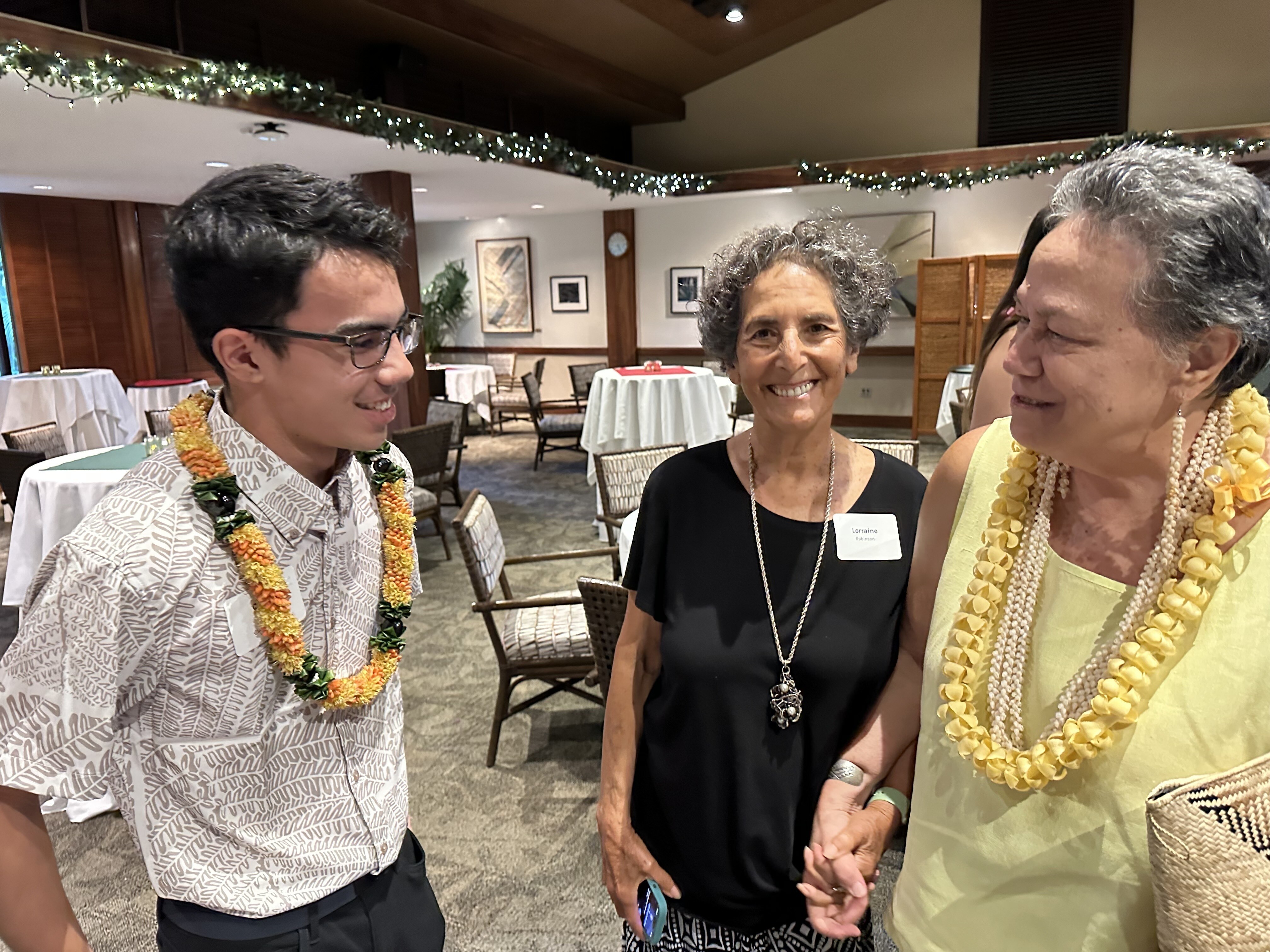 Colton Mills meeting my Mom for the first time. Aunty Rain in the middle smiling | 2024 Paubox Kahikina Scholarship winter networking event