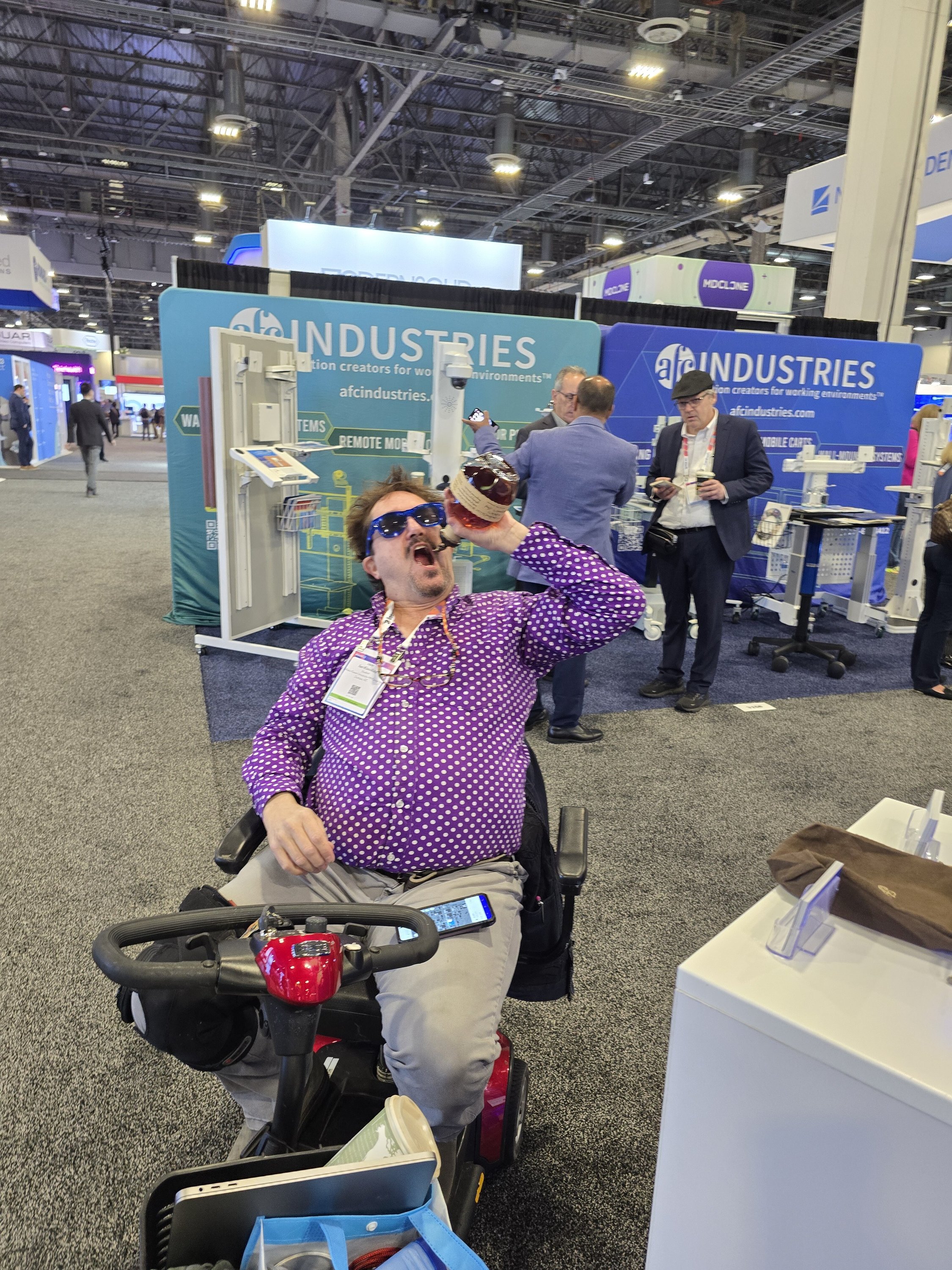 Man in wheelchair at HIMSS 2025