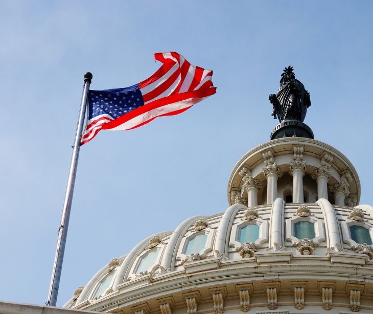 us capitol building american flag