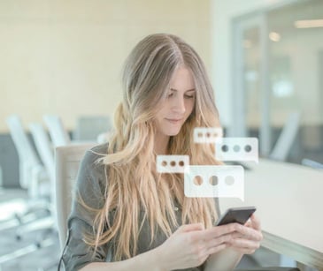 woman texting with smartphone