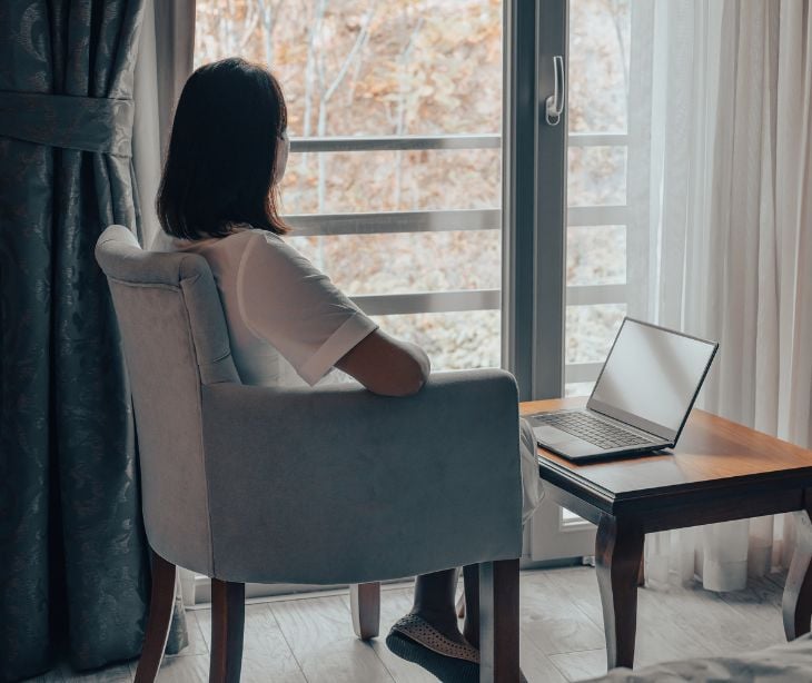 woman sitting at computer