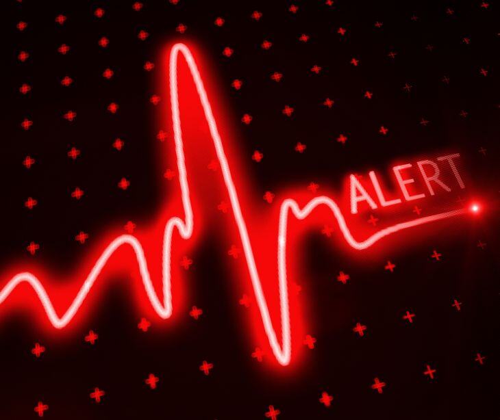 digital heartline with alert text