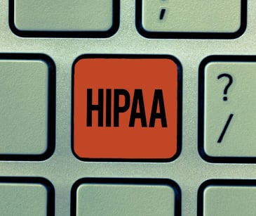 red hipaa key on computer keyboard