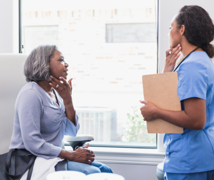 dermatologist with patient