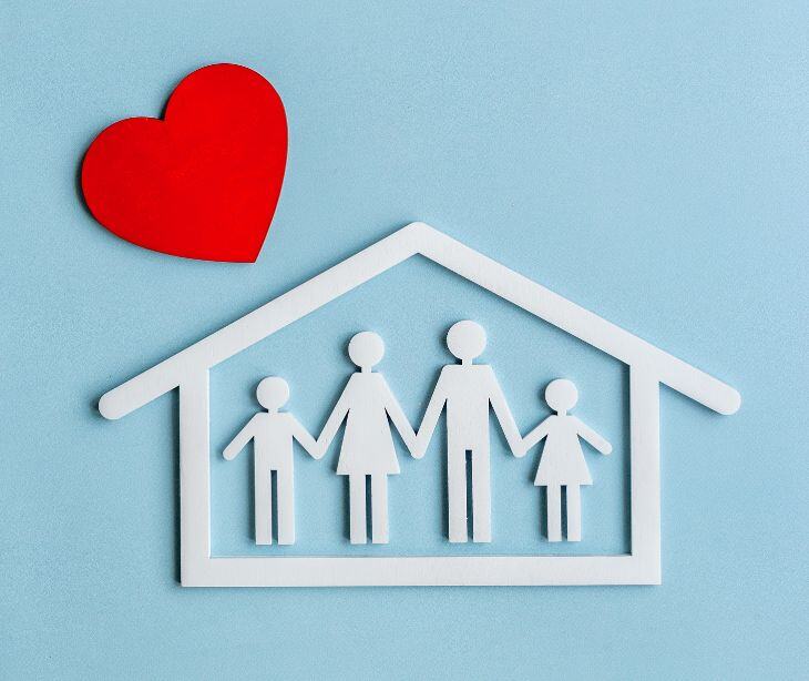 graphic of family icons in house with heart