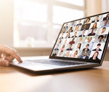 laptop with video conference boxes