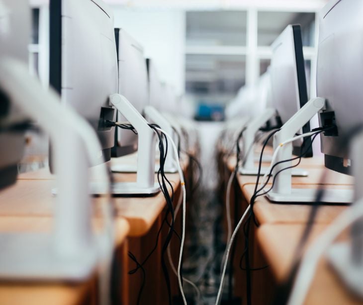 rows of desktop computers