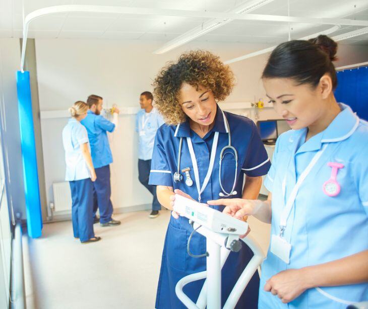 medical staff at a computer station