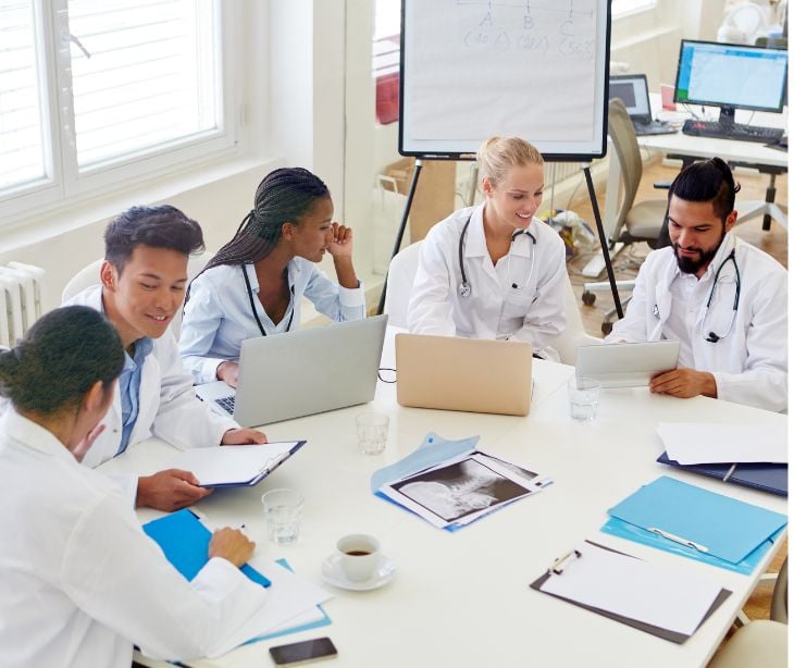 healthcare staff on computers