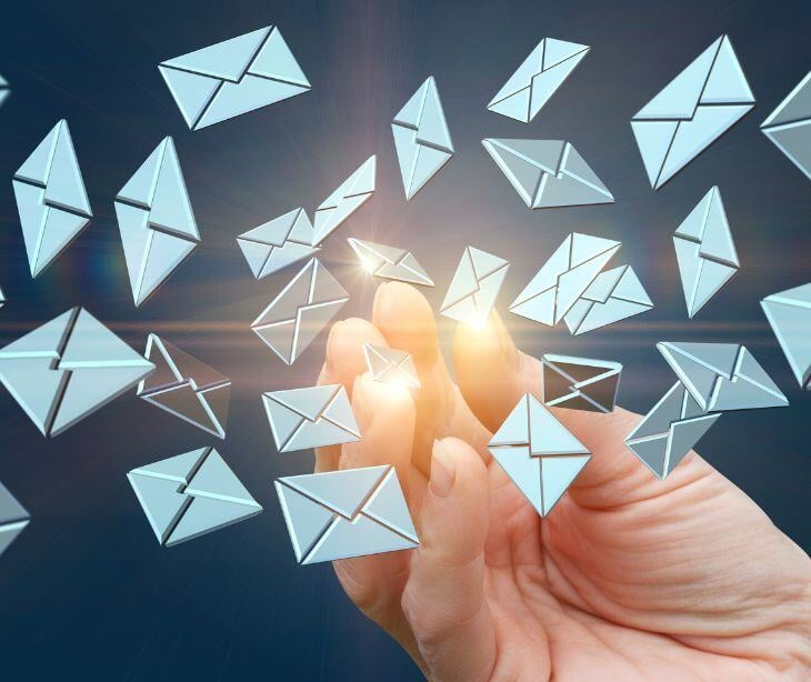 hand with email icons for post Improve healthcare access with collaborative leadership and secure email