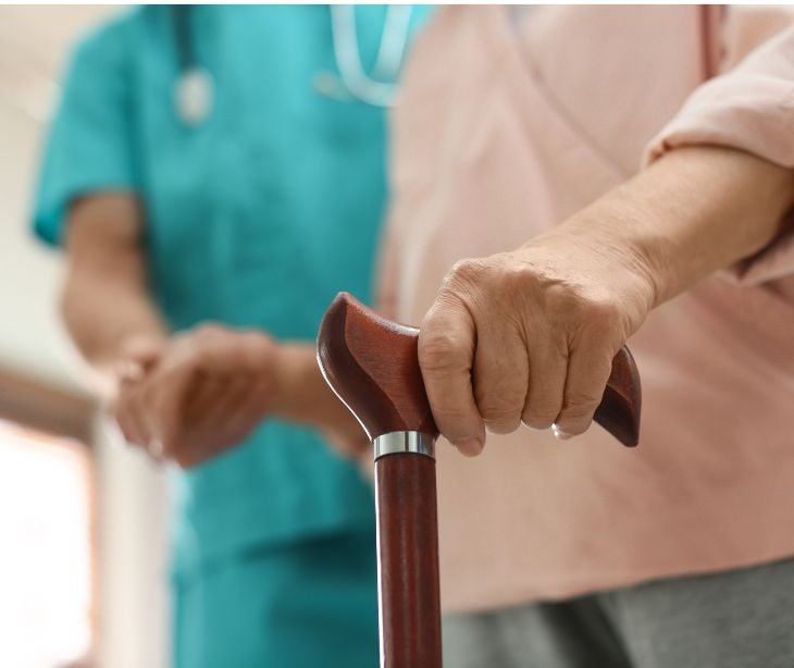 woman using cane