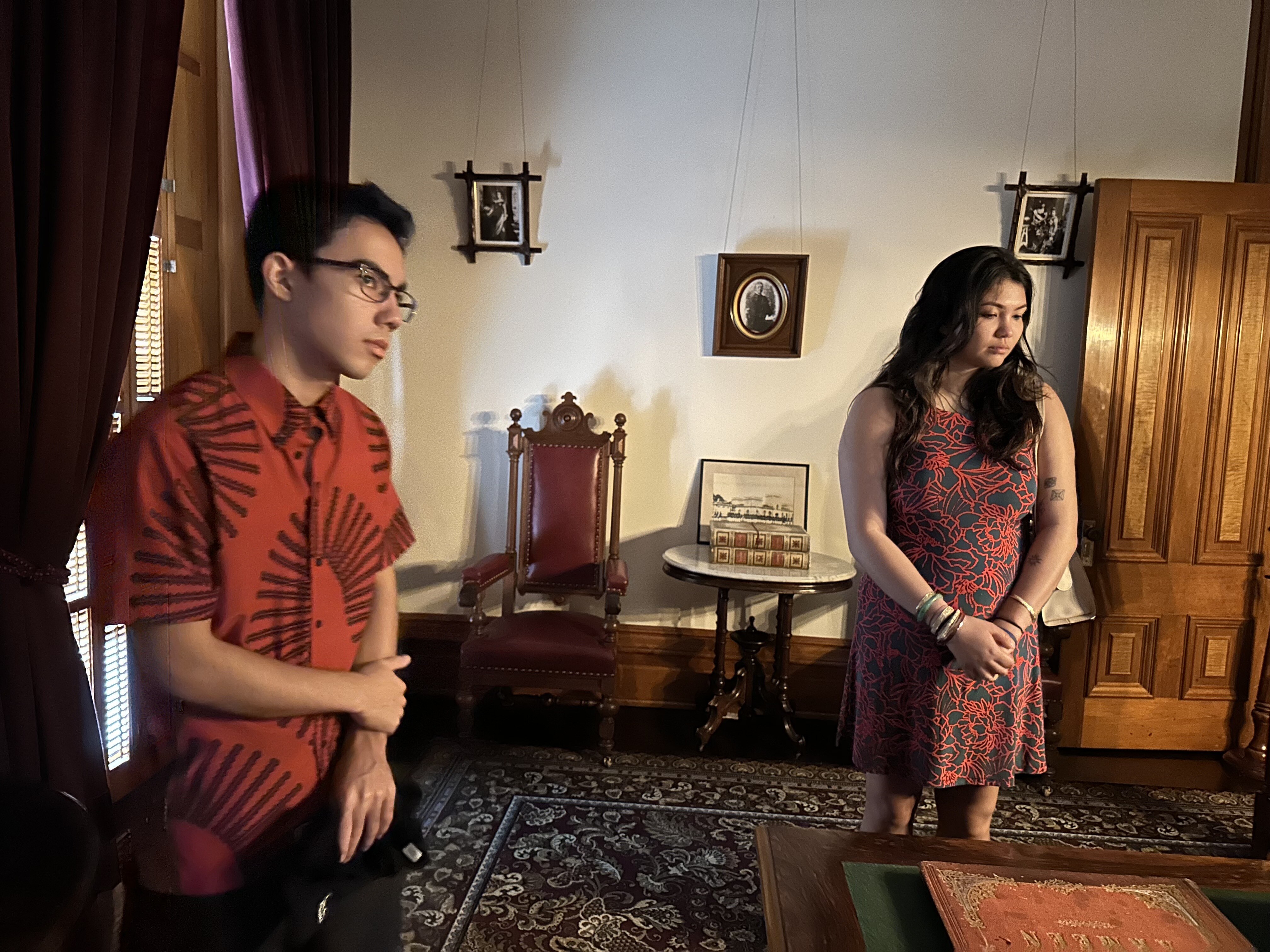 Scholarship recipients Colton Mills and Alyssa Lyman admiring King Kalakaua's library on the second floor | A tour of ʻIolani Palace - Paubox Kahikina Scholarship