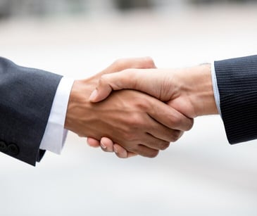 Image of shaking hands for blog about Lessons from Medusind for third-party vendor agreements