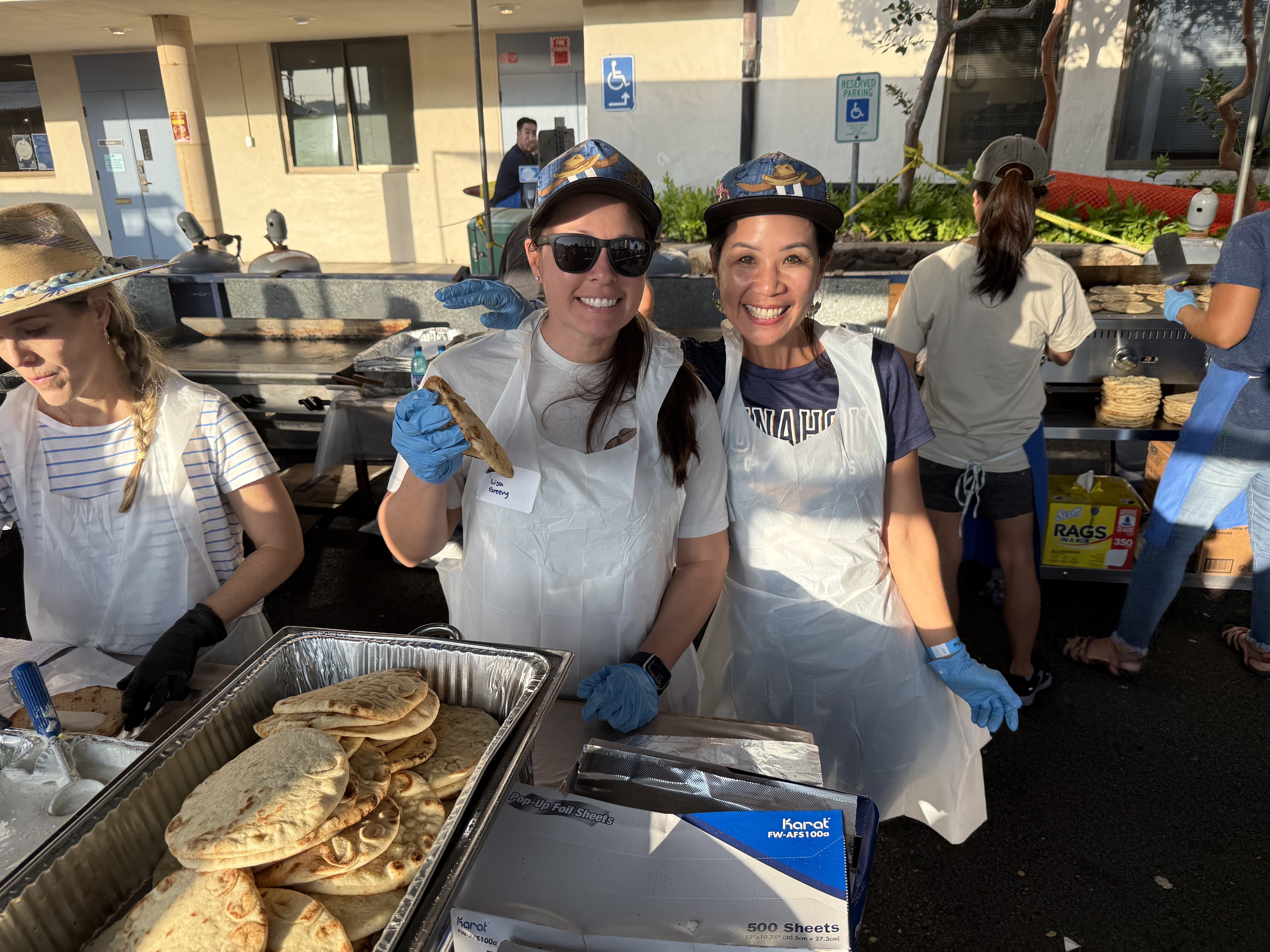 My wife Lisa and her bestie, Kelly Hiraki | Volunteering at the Punahou Carnival: "Yee-Haw Gyros” booth