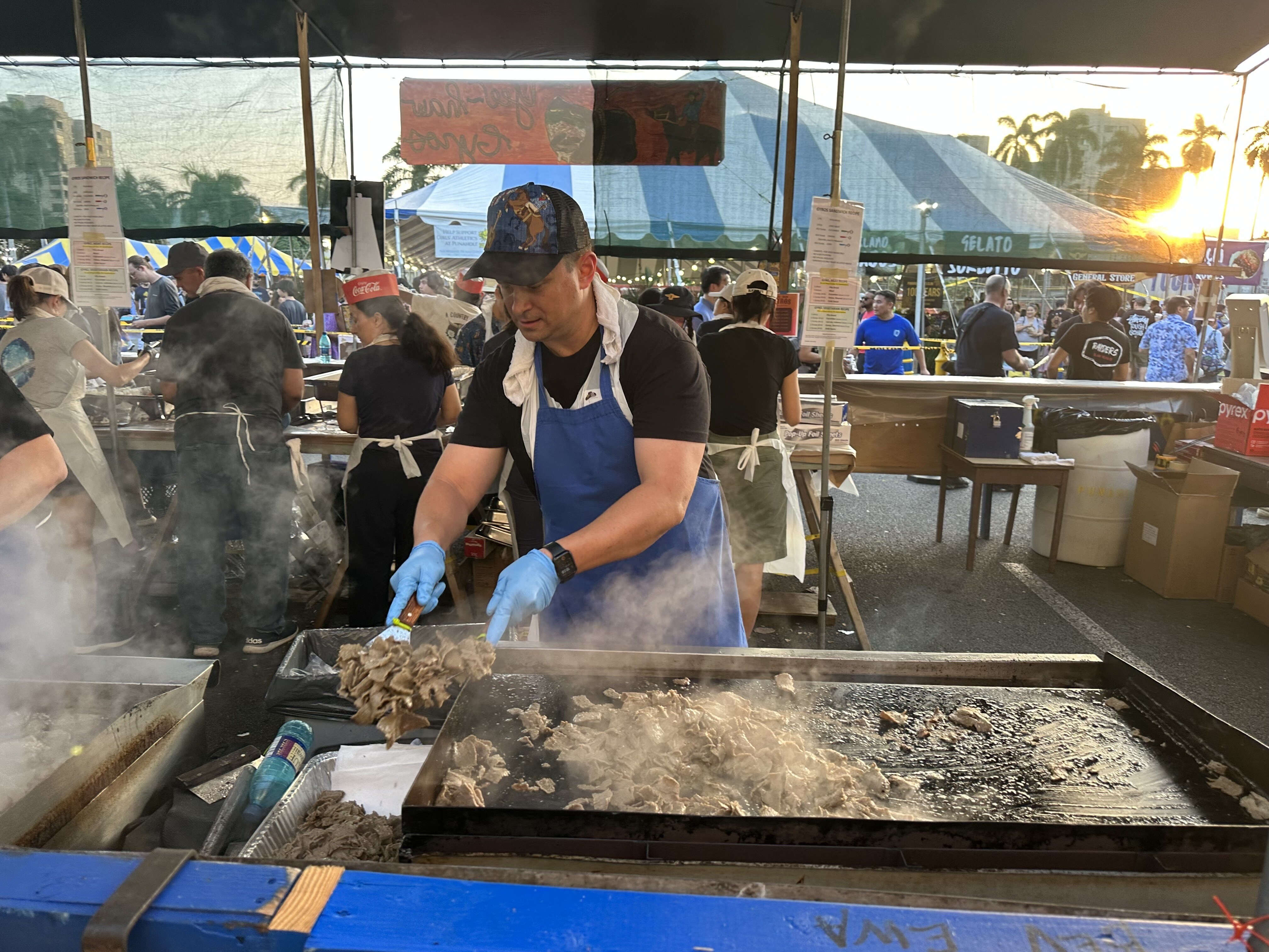 Hoala Greevy getting his grill on | Volunteering at the Punahou Carnival: "Yee-Haw Gyros” booth