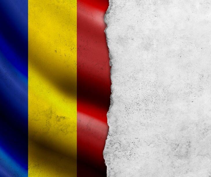 romanian flag torn paper