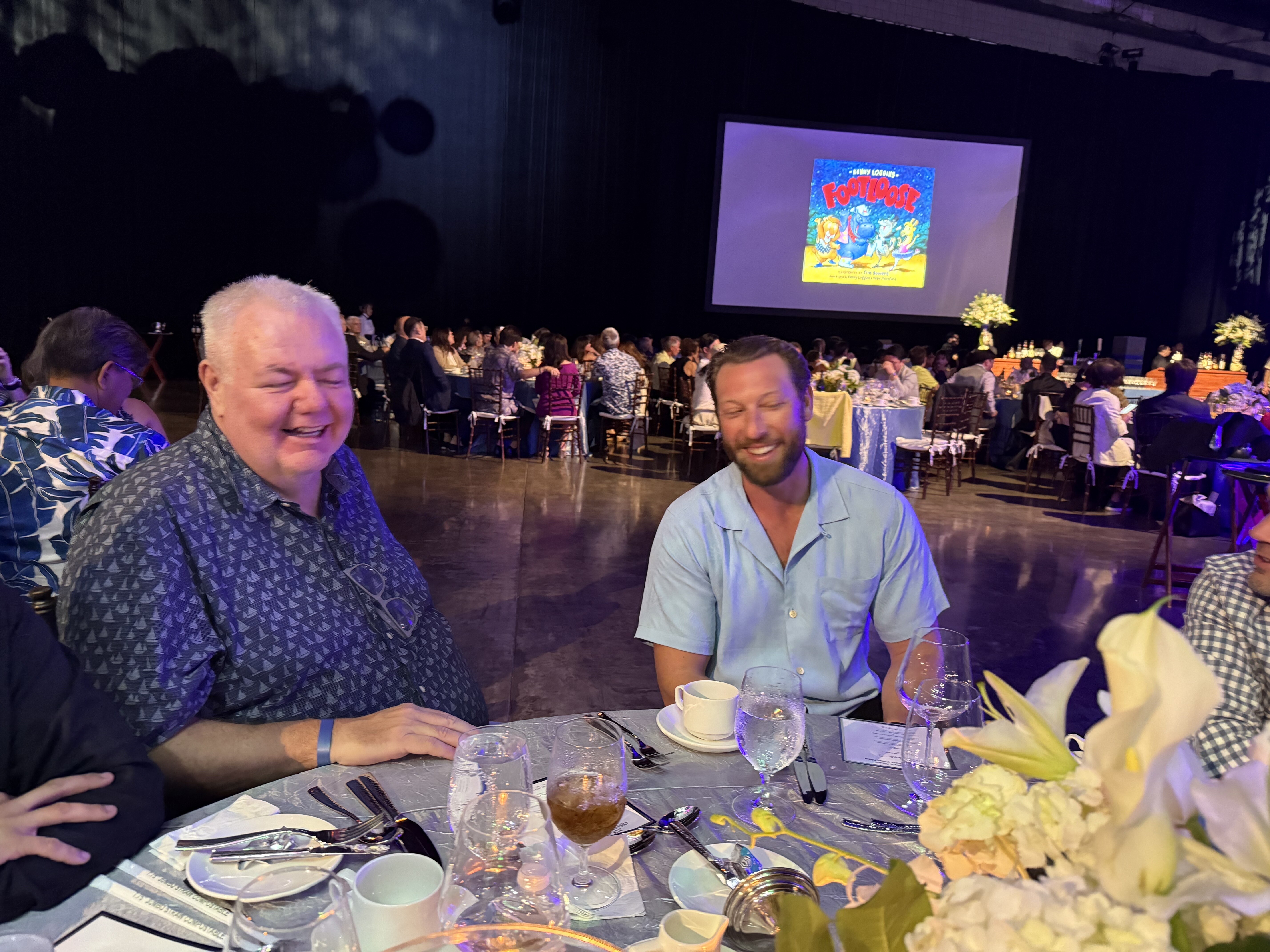 Joe Stewart (left) thinks Hoff had more Kenny Loggins posters | Sony Open dinner with Kenny Loggins