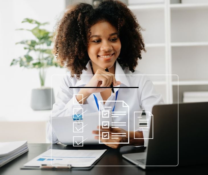 woman at computer with floating form icons