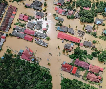 flooded neighborhood for post Supporting teens' mental health after natural disasters with HIPAA compliant email