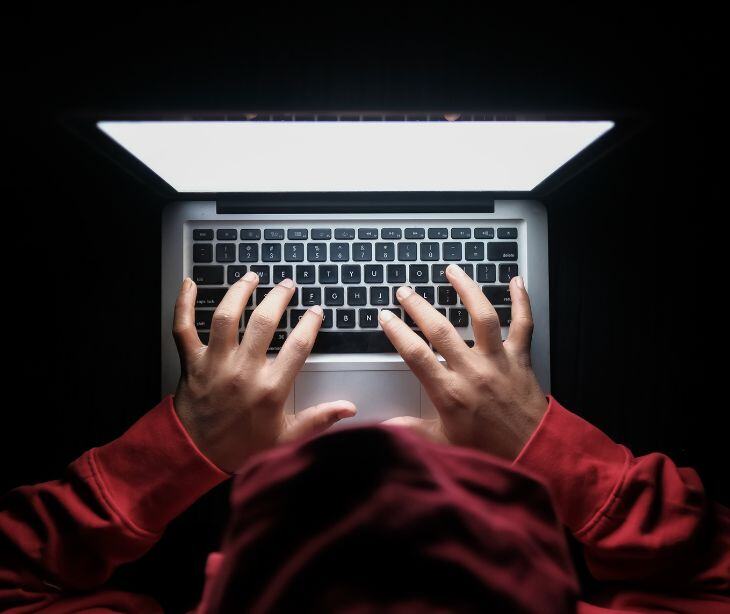 hands at laptop computer