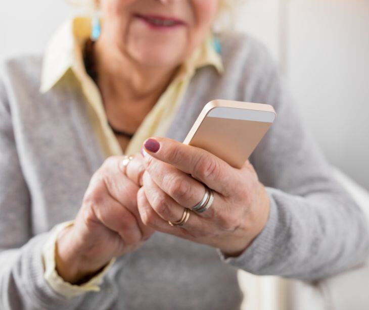 woman holding smartphone