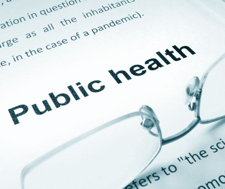 public health text with glasses