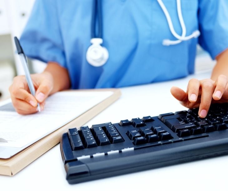 nurse at computer