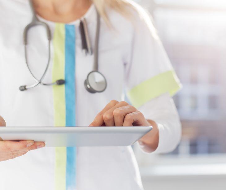 nurse on tablet