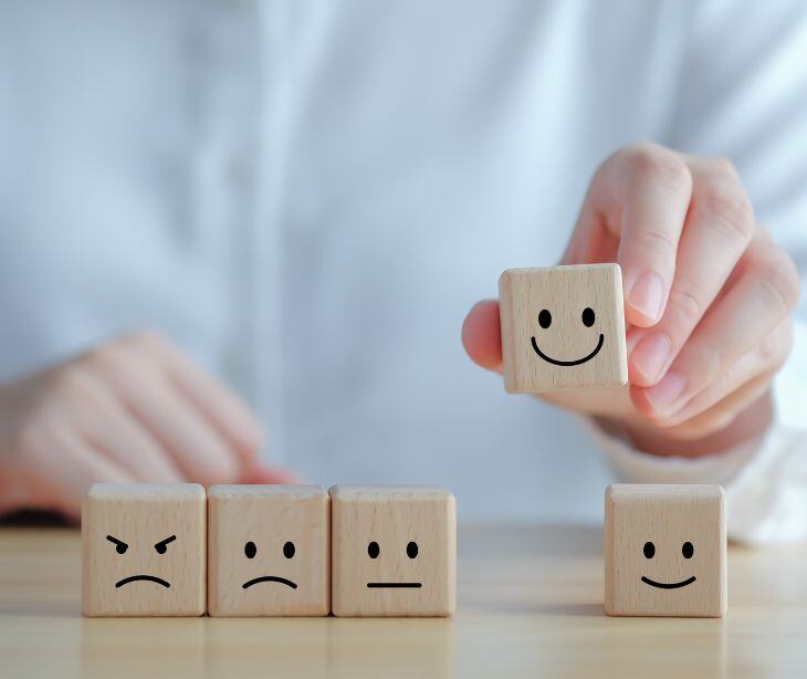 wooden blocks with faces