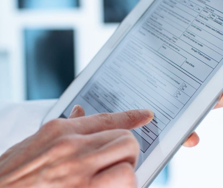 form on tablet for Using HIPAA compliant forms for new patient registration