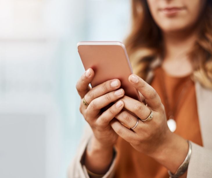 woman holding smartphone