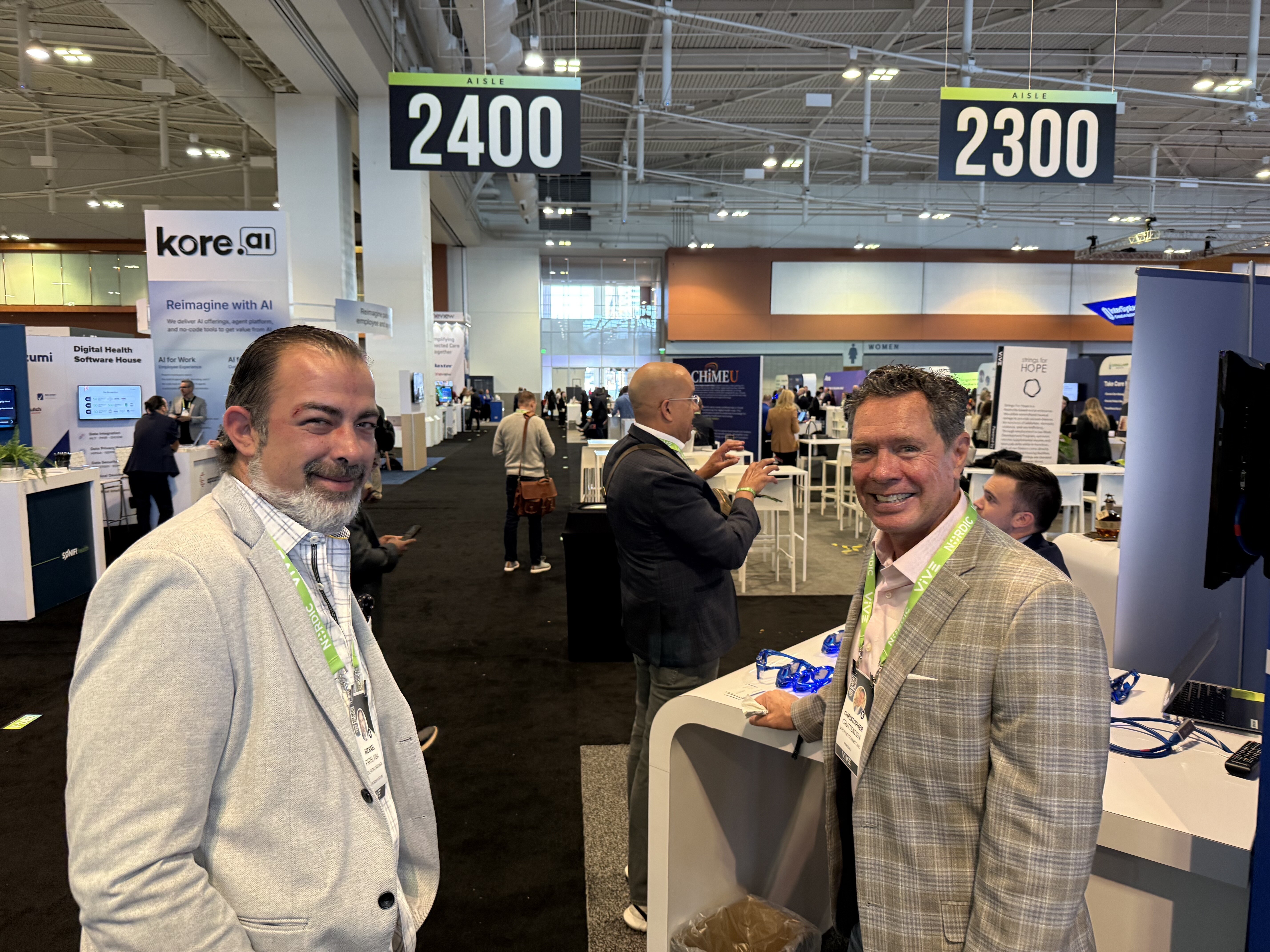 Mike Parisi and Chris Cruttenden chillaxin at the Paubox booth | "ViVE is the new HIMSS" - ViVE Nashville 2025