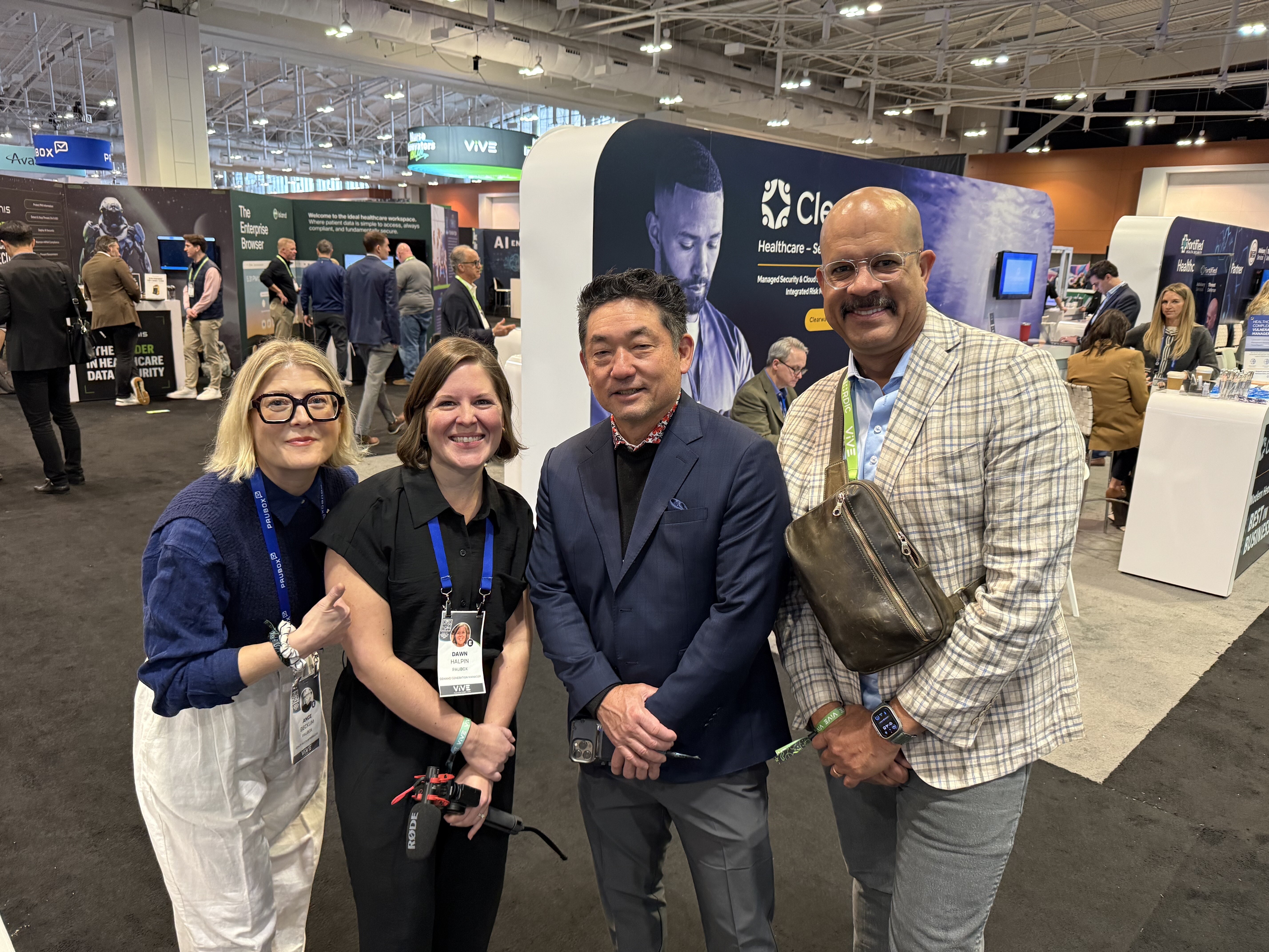 (left to right): Ange Beckum, Dawn Halpin, Keith Matsutsuyu (Safety Net Connect), and Jomo Starke | Visiting customers at ViVE Nashville 2025