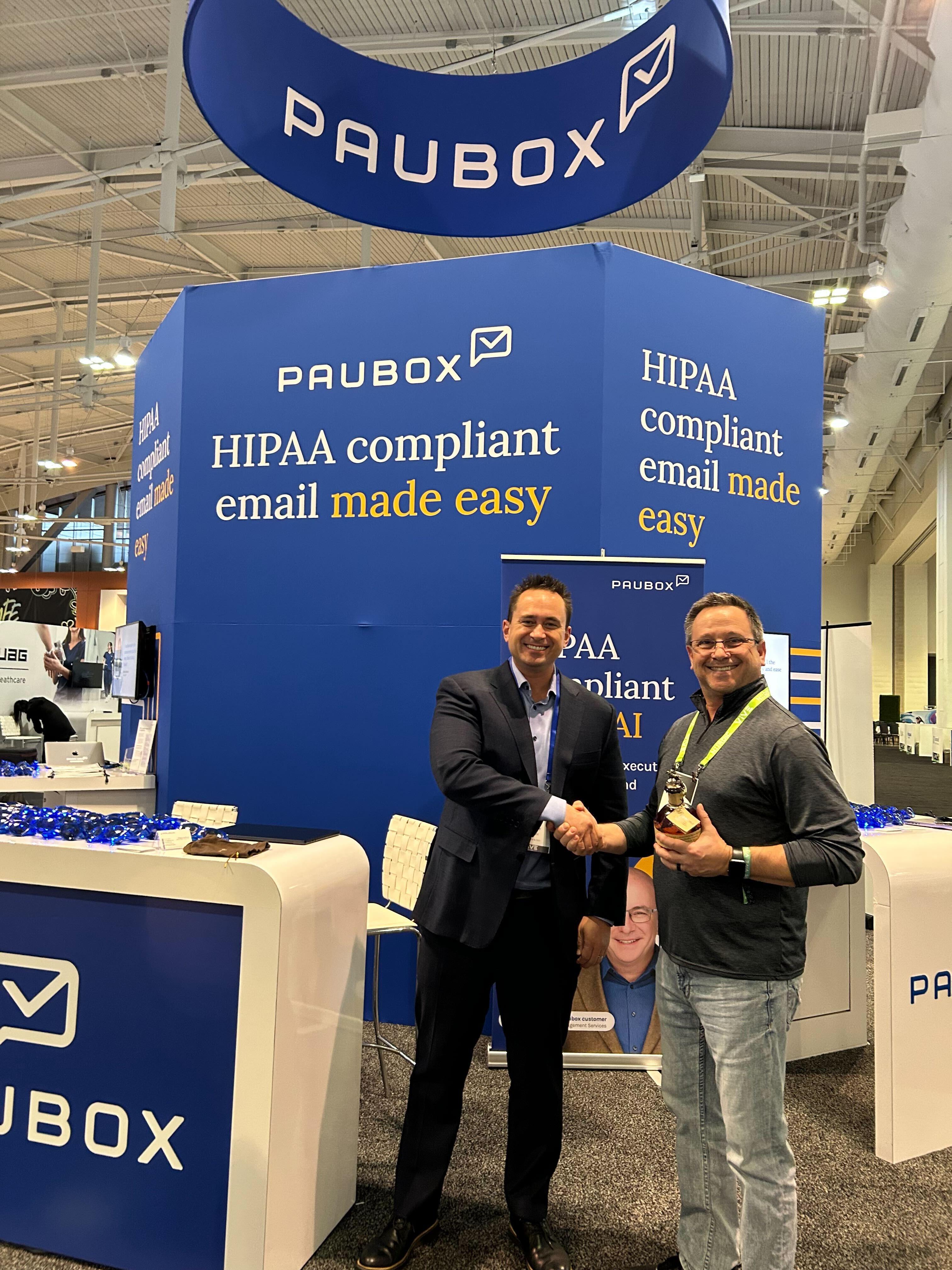 Hoala Greevy congratulating Scott Meyers () for winning our Blanton's Bourbon giveaway | Visiting customers at ViVE Nashville 2025