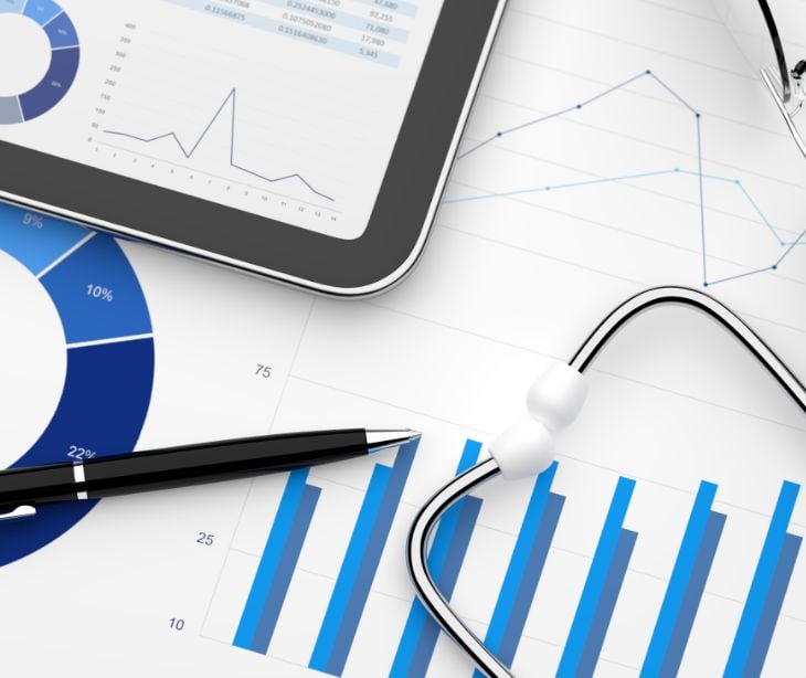 tablet and chart with pen and stethoscope