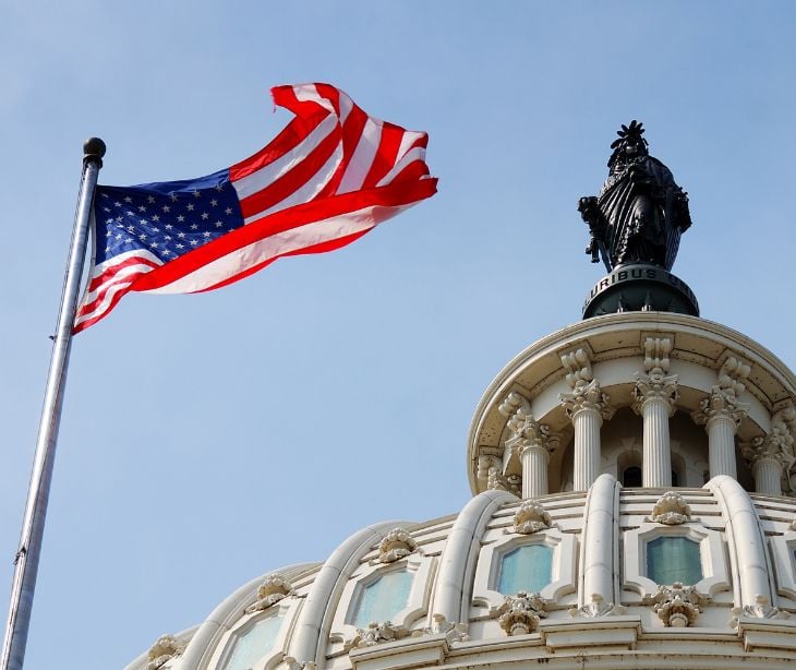 capitol building with US flag