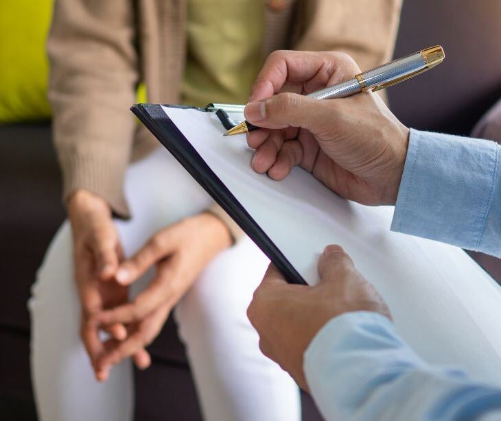 patient and provider with clipboard