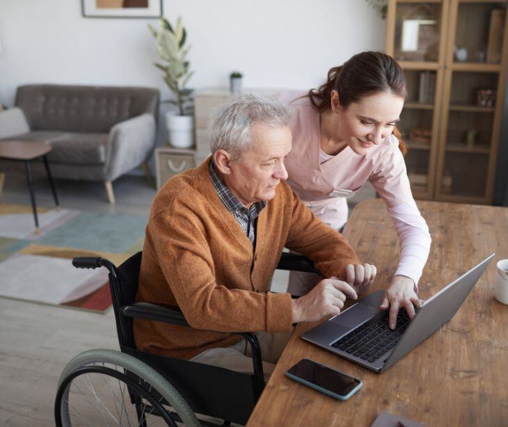 caregiver and patient at computer